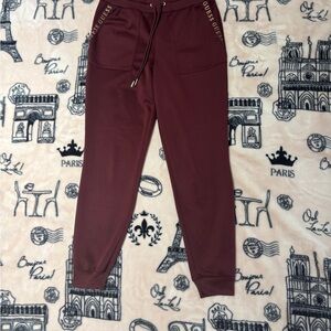 Guess Maroon Joggers with Gold Details